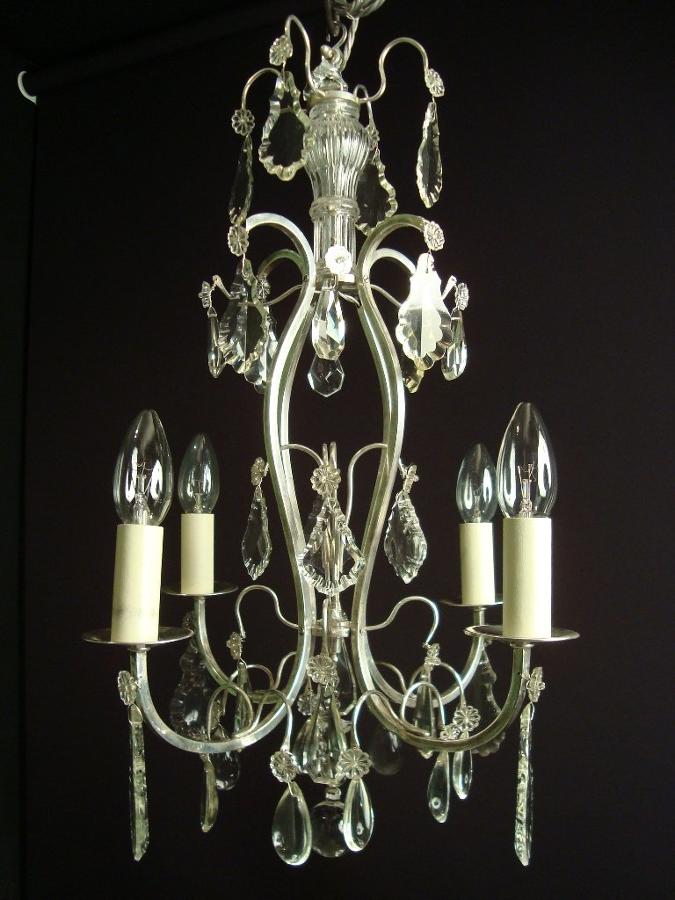 A silvered brass and crystal chandelier
