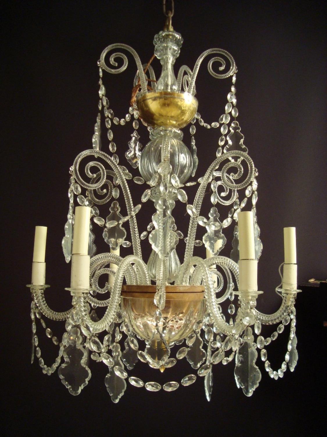 A six armed glass and gilded chandelier