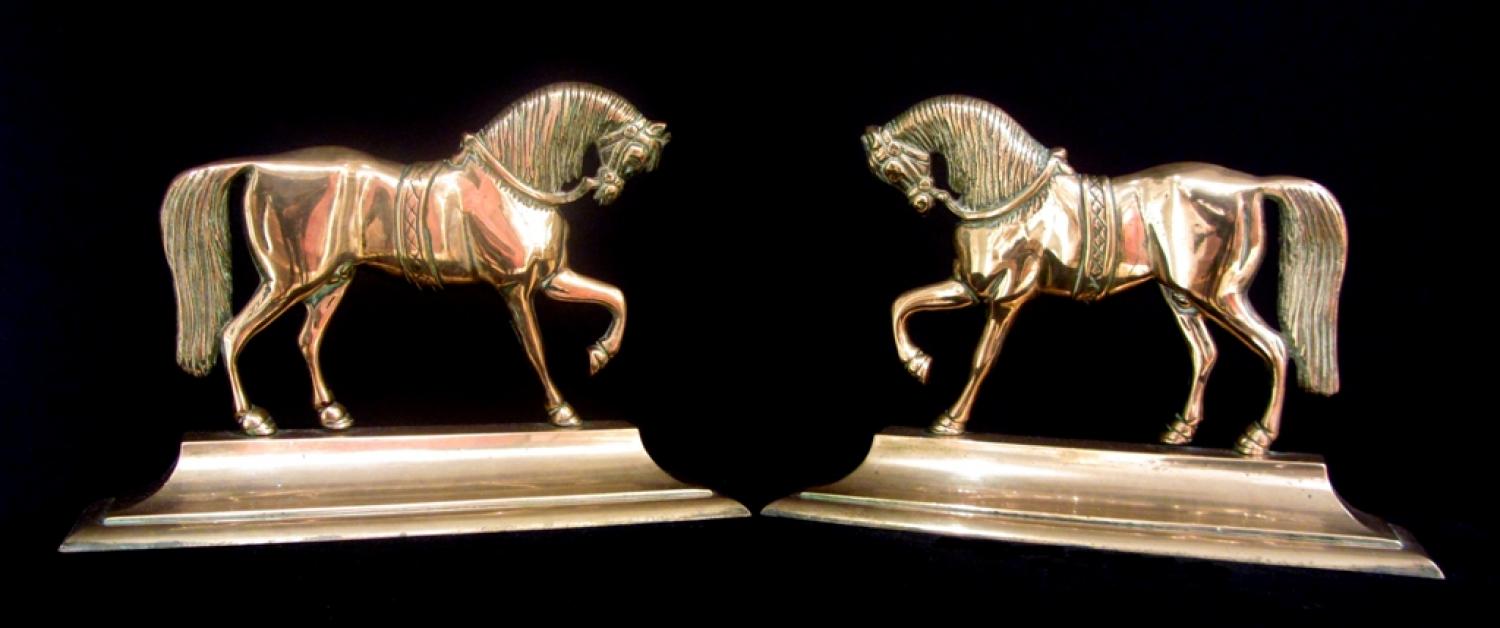 A pair of horse ornaments