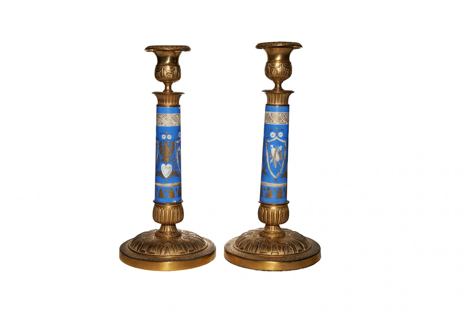 A pair of bronze blue porcelain candlesticks