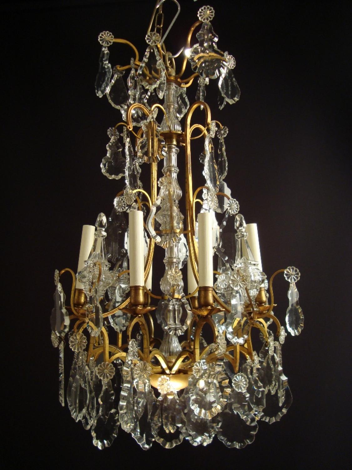 A gilt lacquered and crystal chandelier