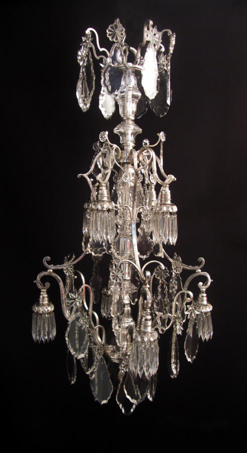 An unusual eight light silvered chandelier