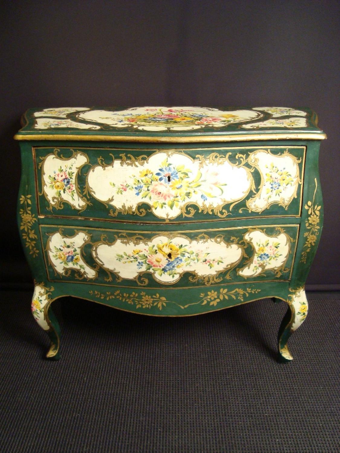 An Italian painted serpentine commode