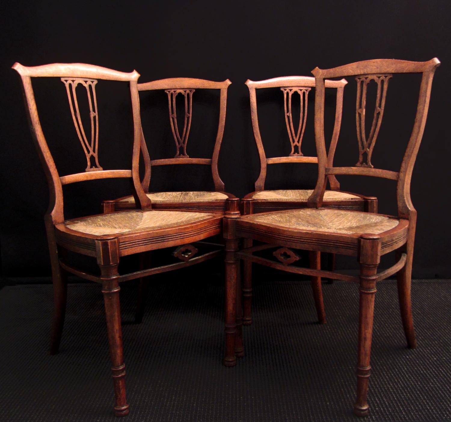 A set of four Arts and Crafts Style chairs