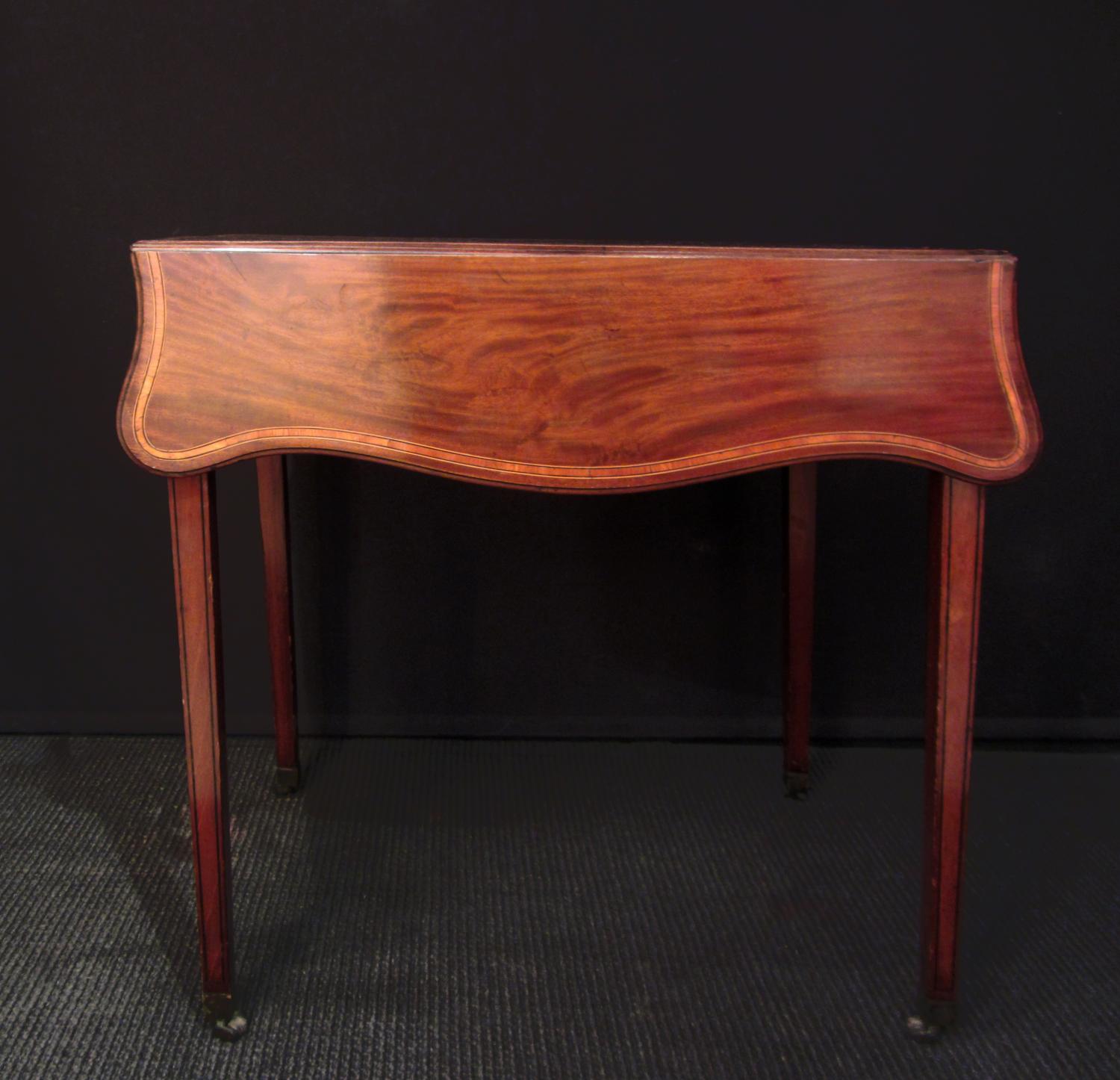 A mahogany pembroke table