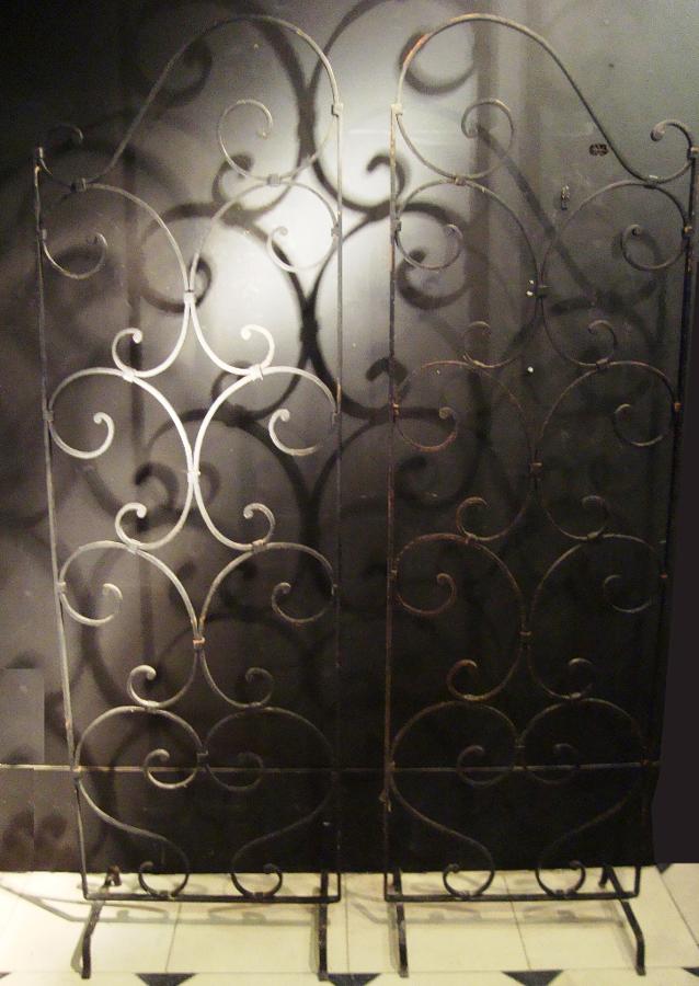 A pair of wrought iron screens