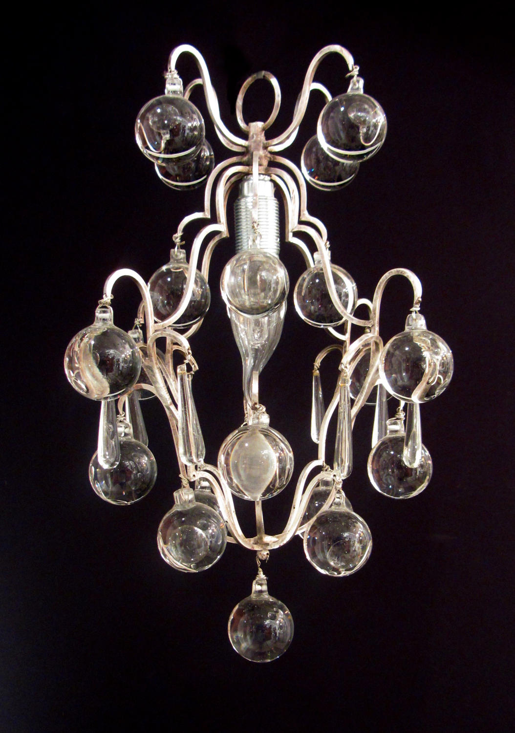 A silvered 'ball' chandelier