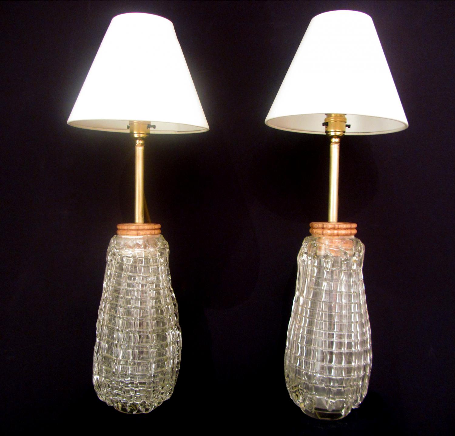 A pair of unusual glass lamps