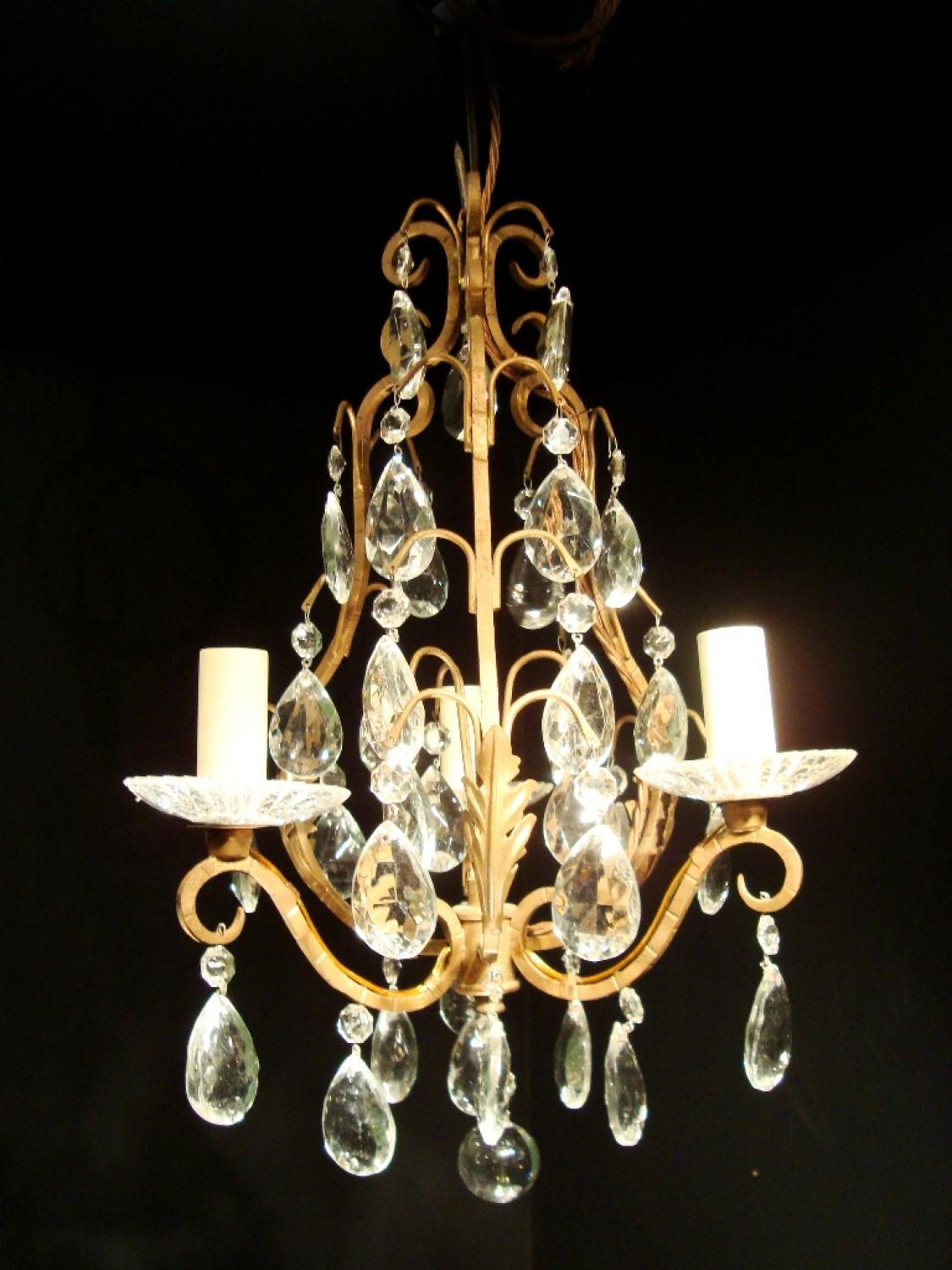 A small three arm chandelier