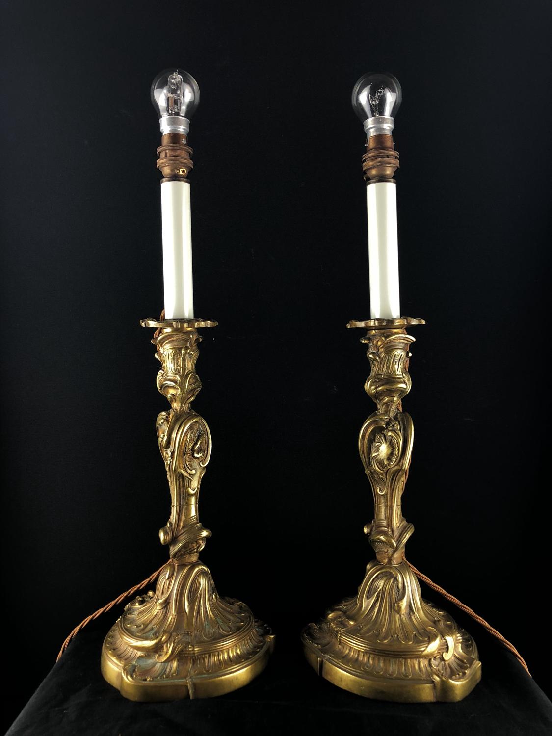 A pair of Louis XV style candlestick lamps