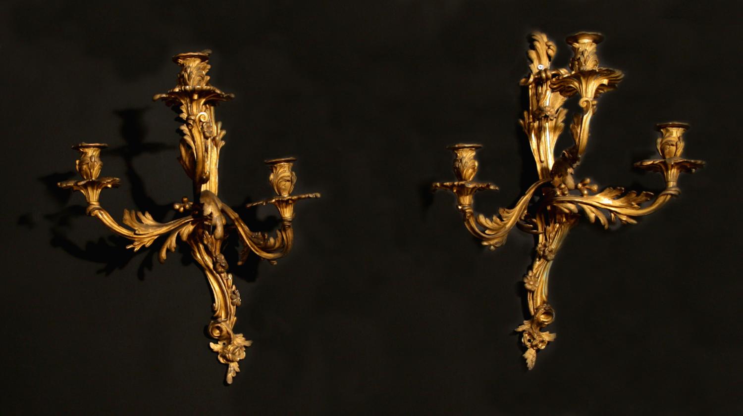 A pair of Louis XV style wall lights