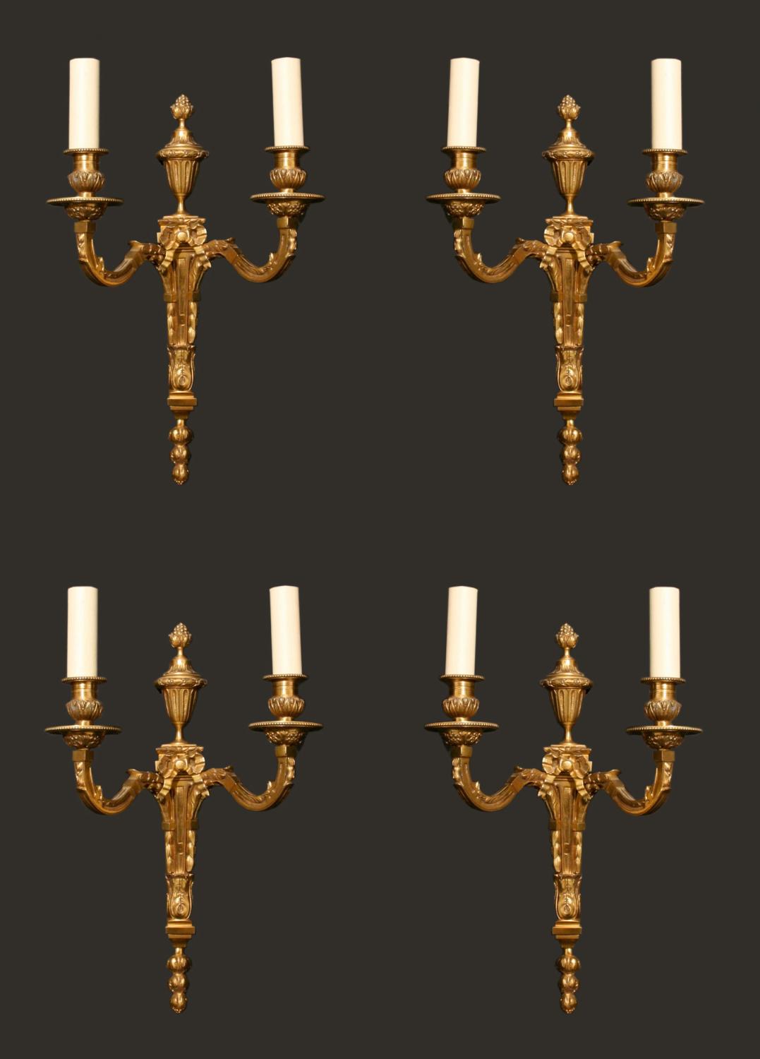 A set of four Louis XVI style wall lights
