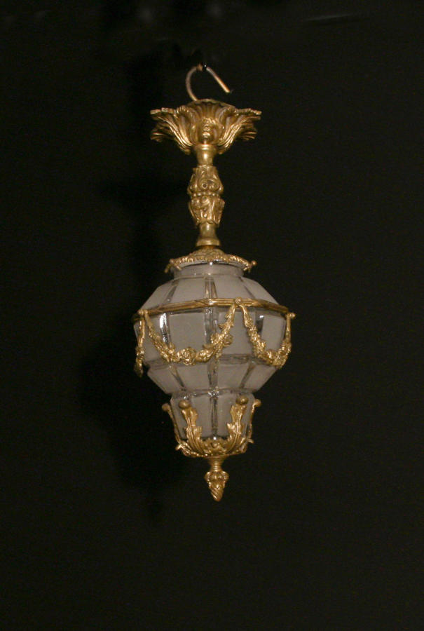 A Louis XVI style figural lantern