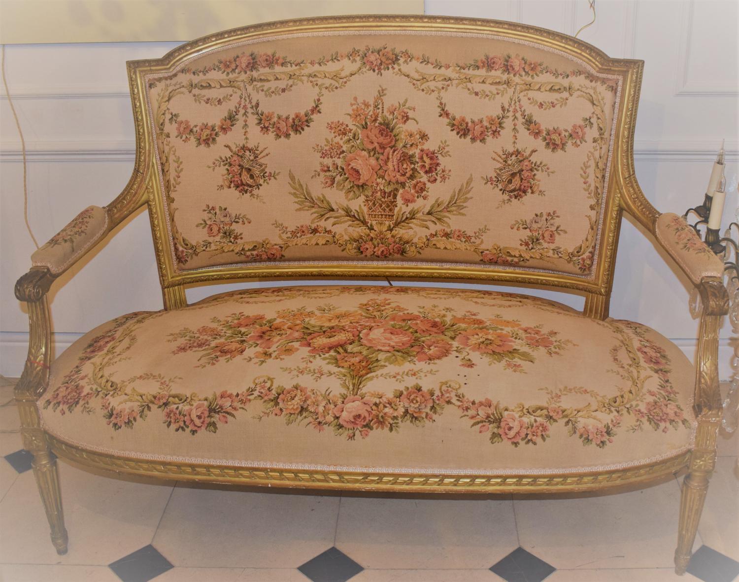 A Louis Phillipe water gilded and carved small settee