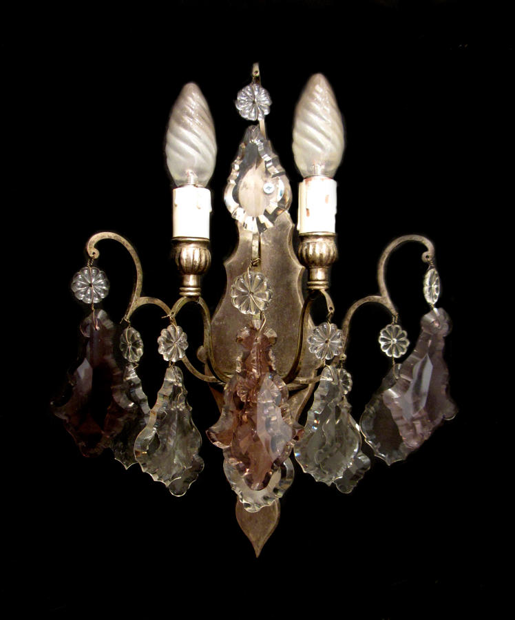 A single silver and crystal wall light