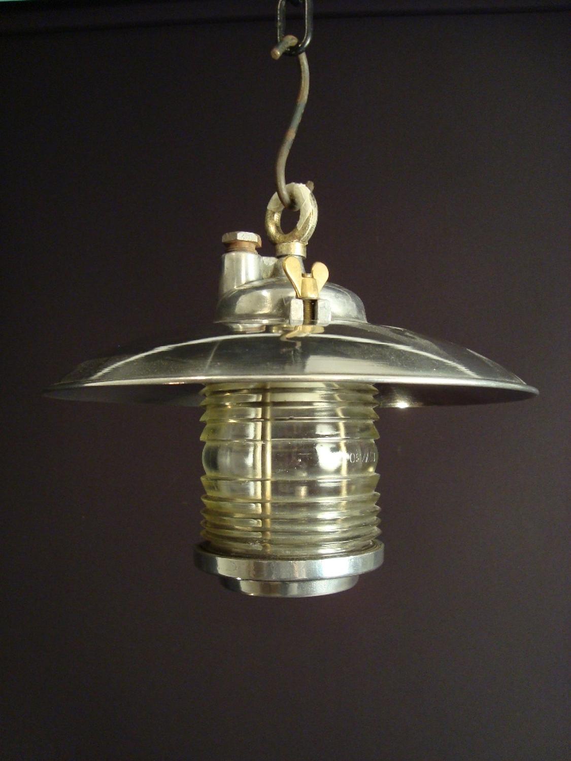 A silvered holophane ceiling light