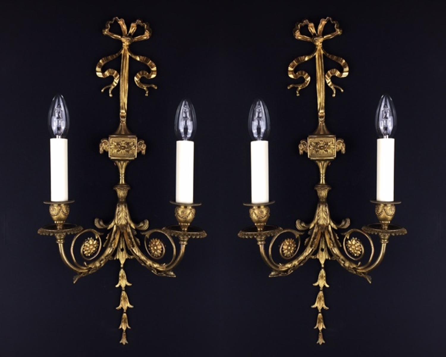 A set of 5 Louis XVI style gilt bronze wall lights