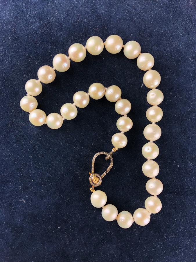 A Large Baroque 30 Pearl Necklace