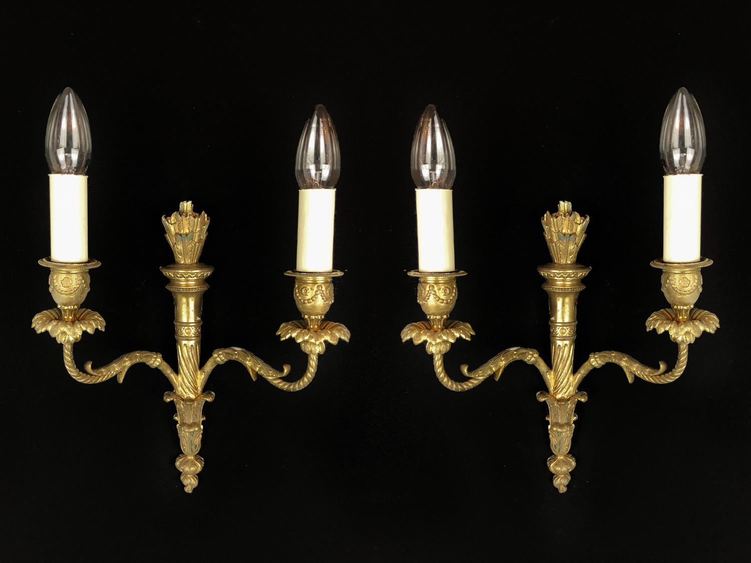A set of 3 Louis XVI style wall lights