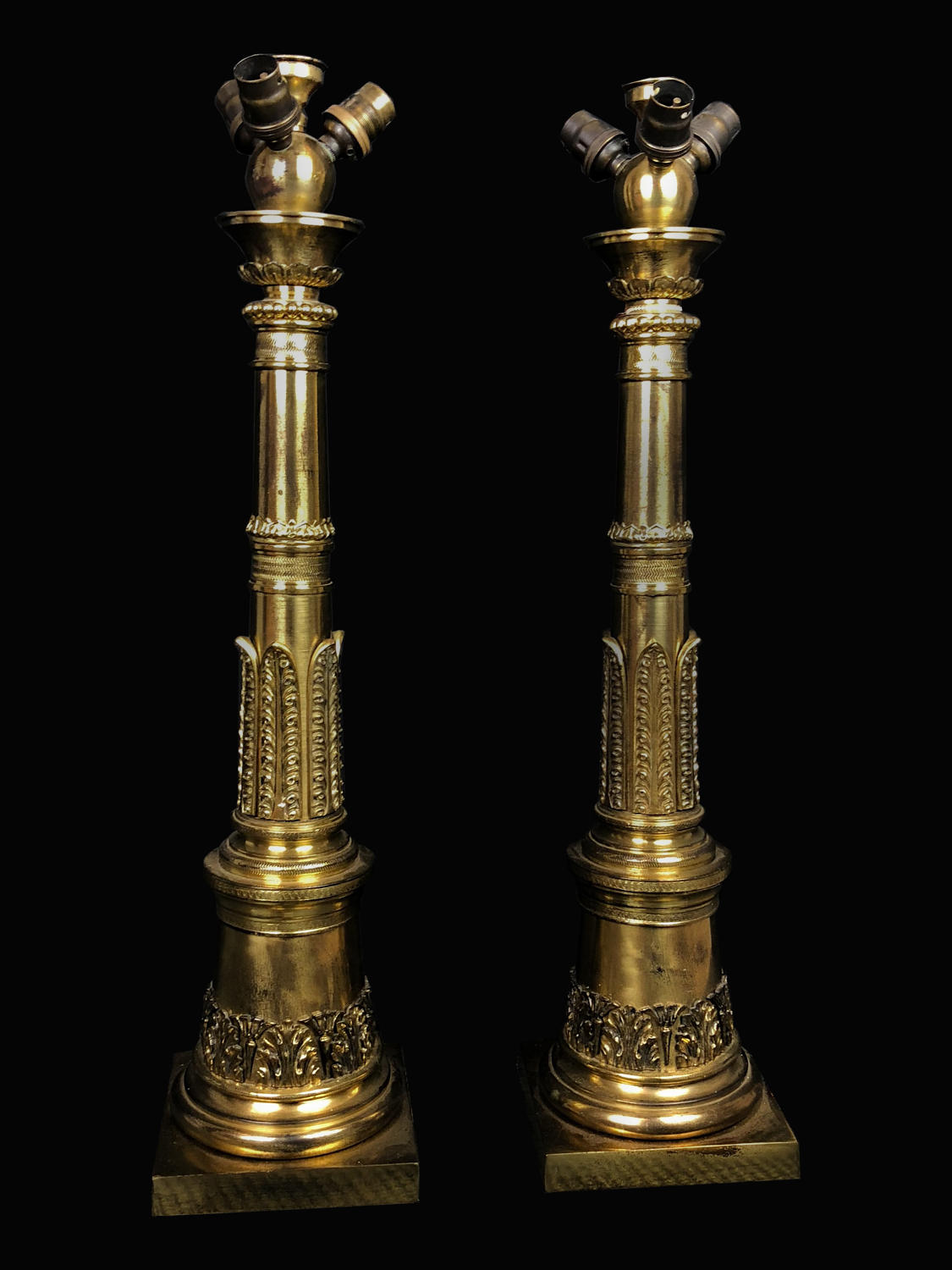 A pair of gilt brass neoclassical column lamps