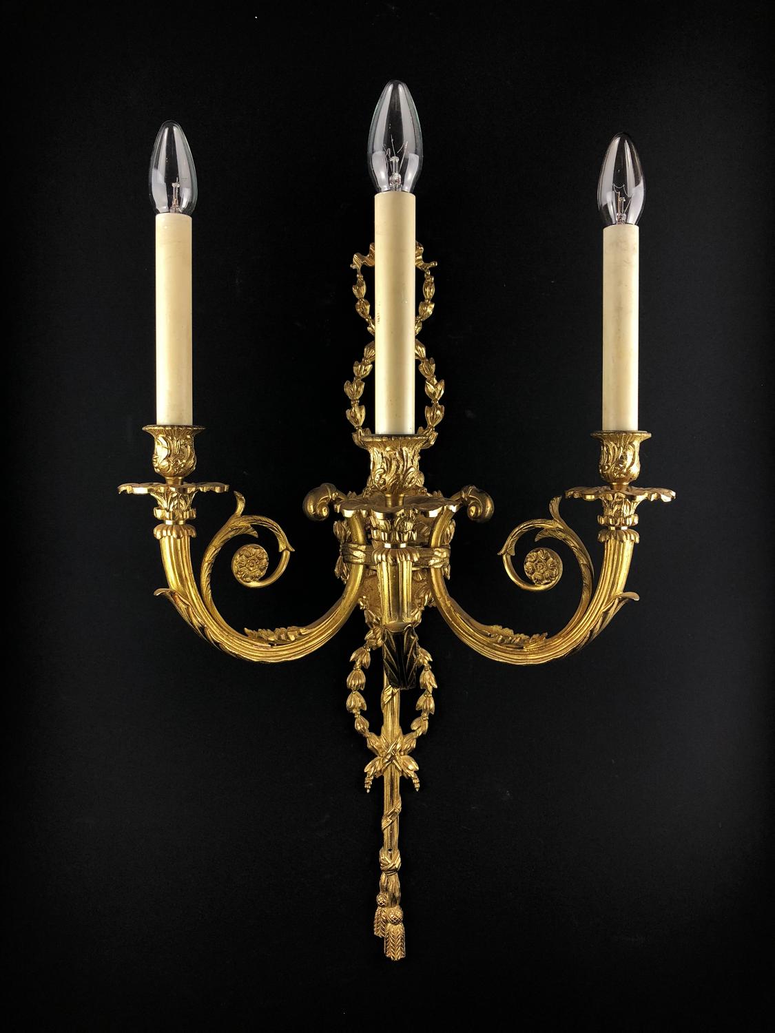 A large 3 arm Louis XVI style wall light