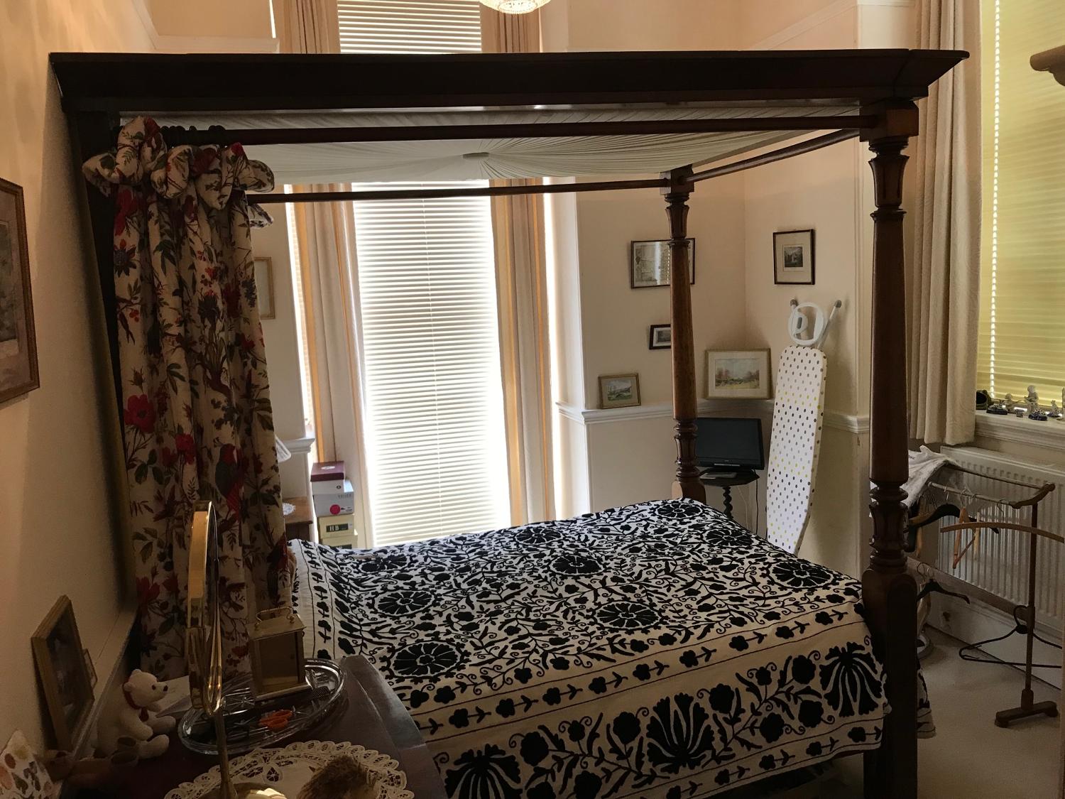A 19th century mahogany four poster bed