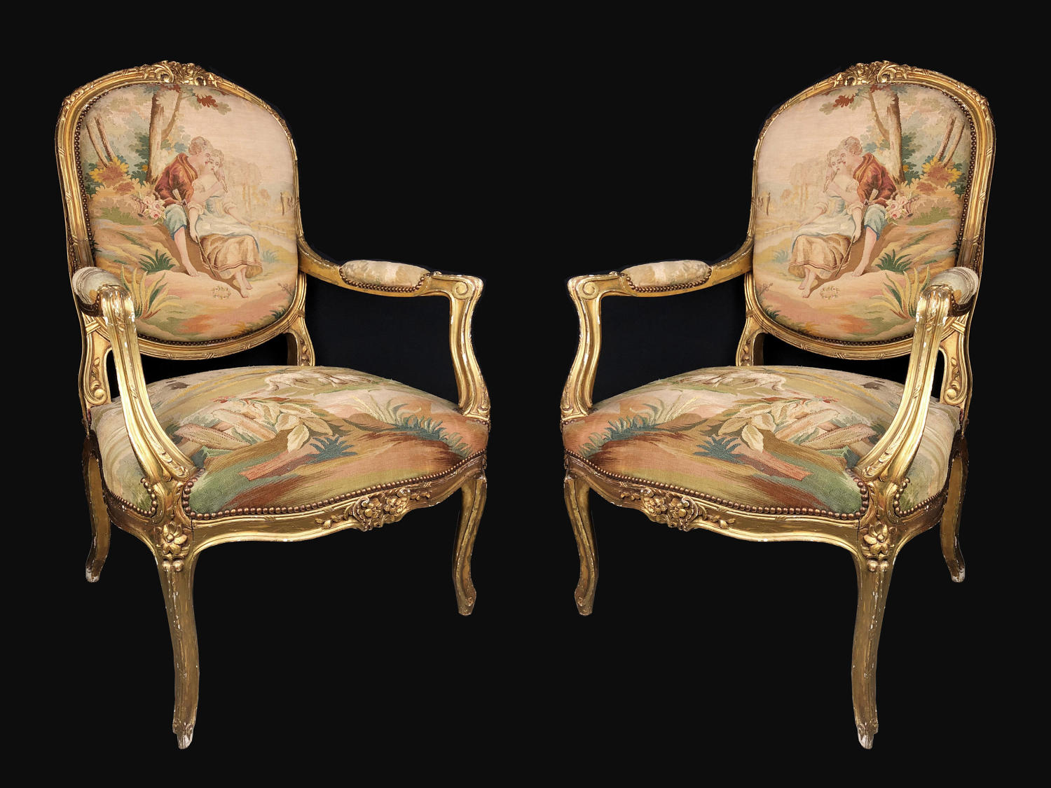 A pair of gilt-wood and Beauvais / Aubusson tapestry chairs