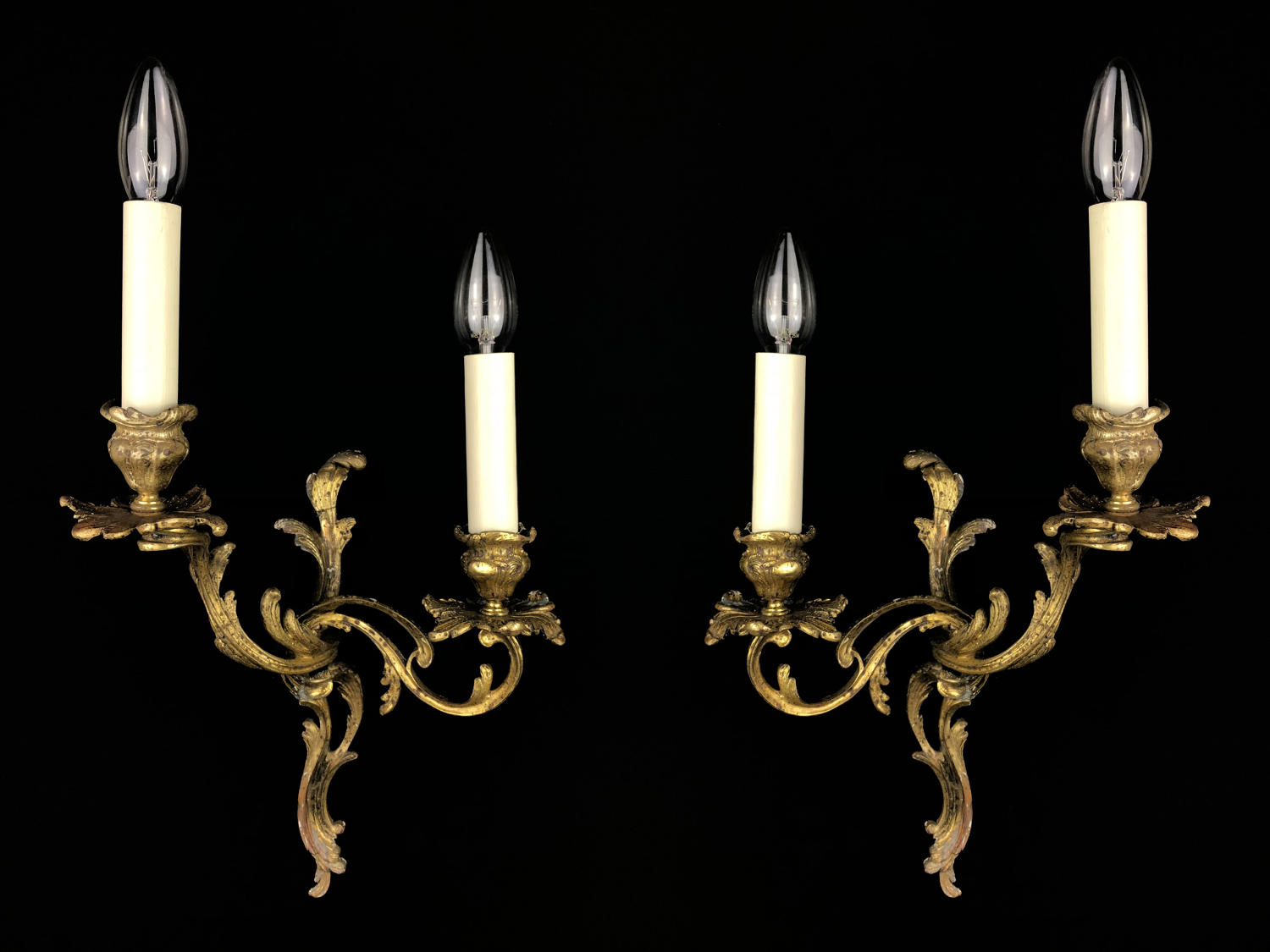 A pair of Rococo style wall lights
