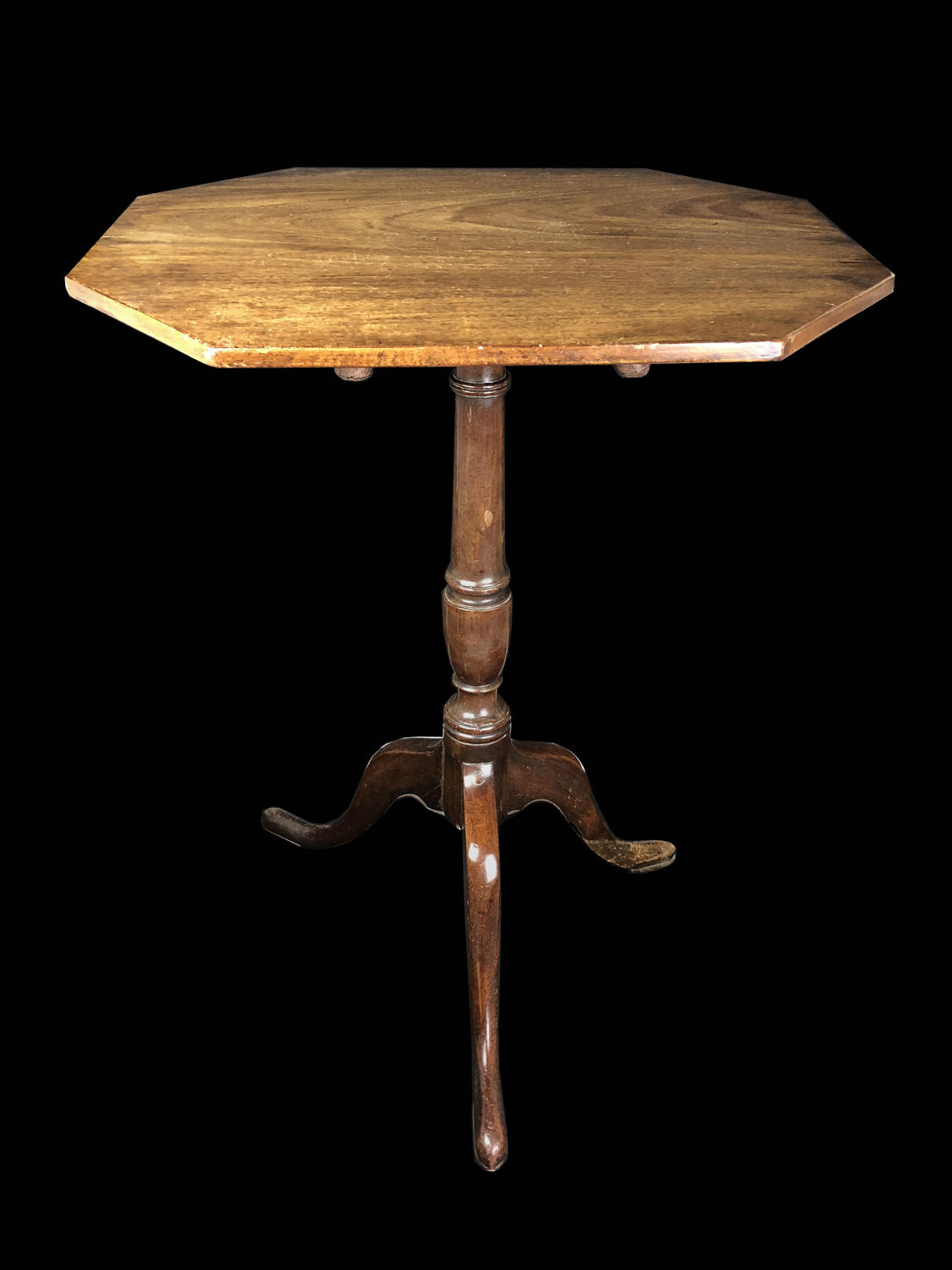 A mahogany tripod table