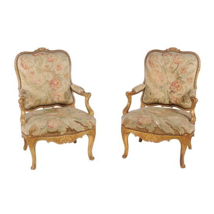 A pair of gilt-wood and tapestry chairs