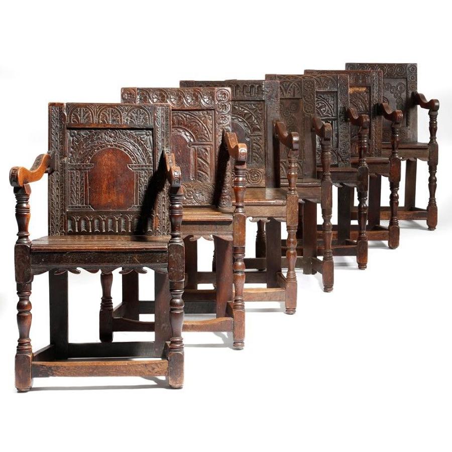Seven Wainscott oak back 17th century armchairs