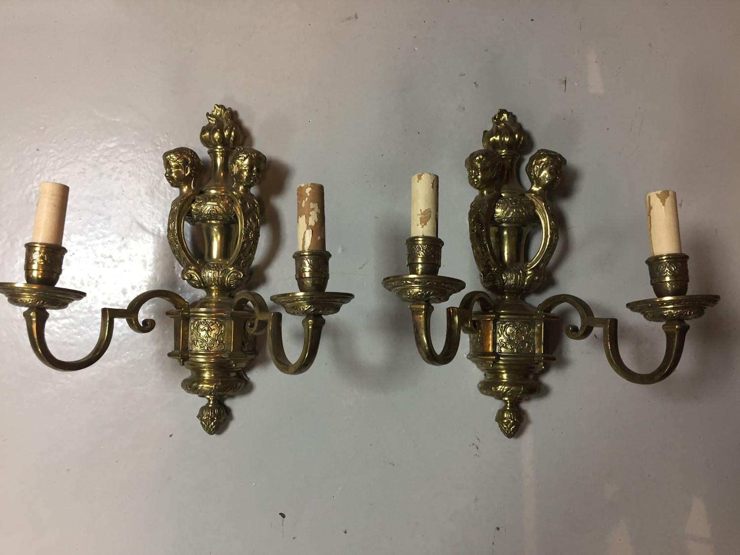 A pair of gilt-brass Knole style wall lights