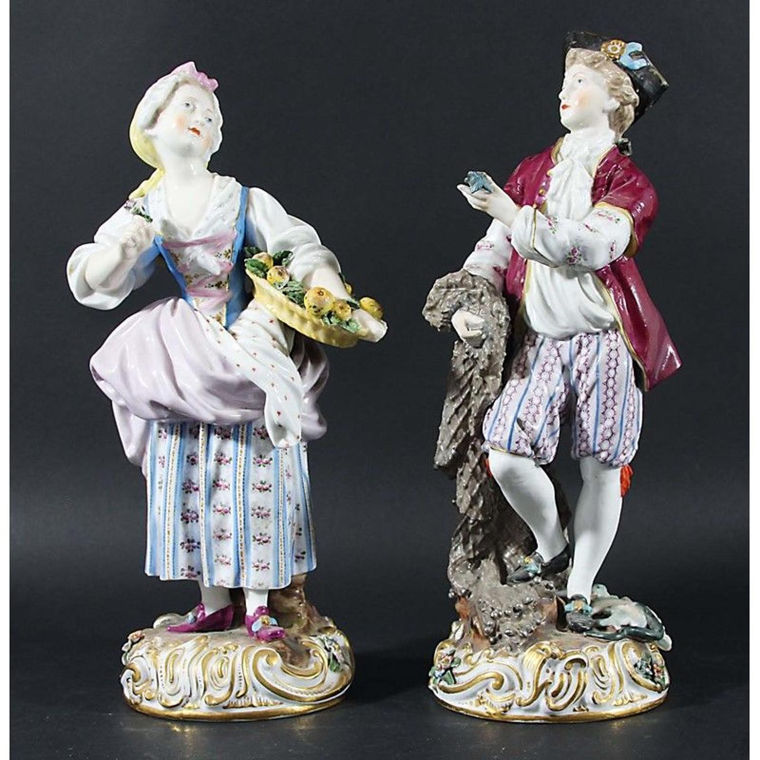 A pair of Meissen style figures
