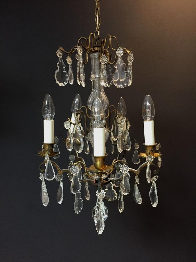 A small gilt-brass and cut glass chandelier