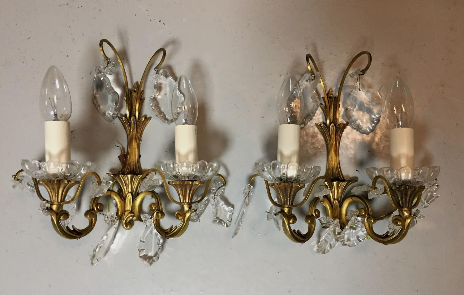 A pair of Louis XVI style wall lights