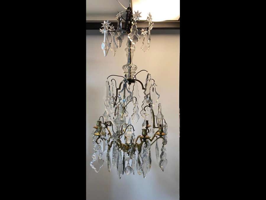 A Louis sixteenths style cut crystal glass chandelier