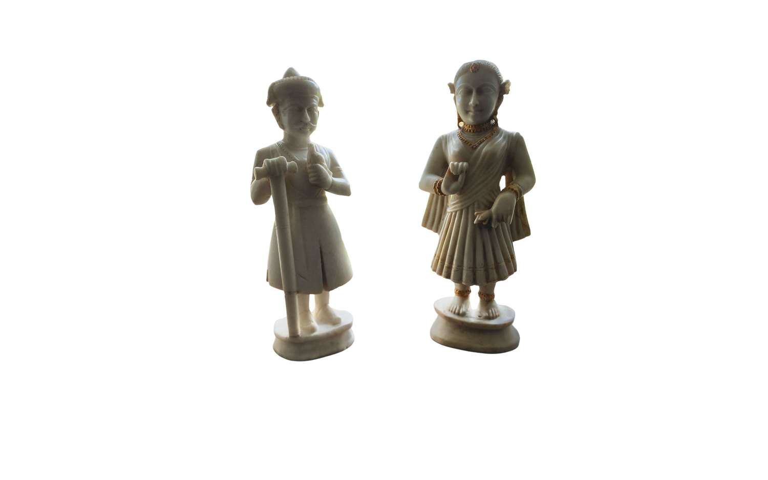 A pair of Carrara white translucent marble 19th-century Indian figures