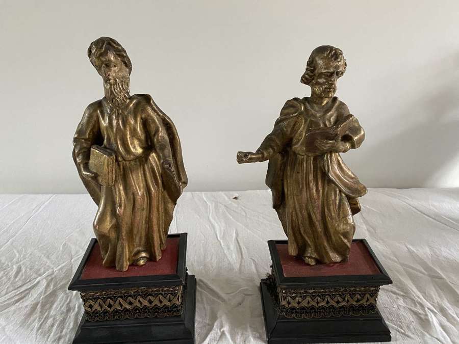 A pair of Carved limewood and gilded figures