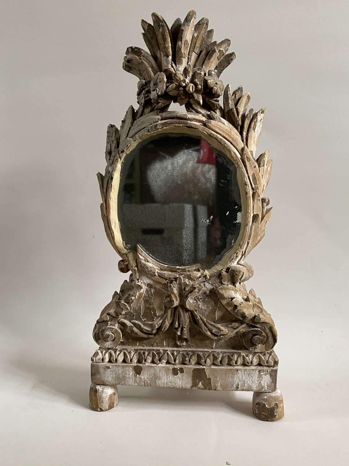 A carved Beechwood French mirror