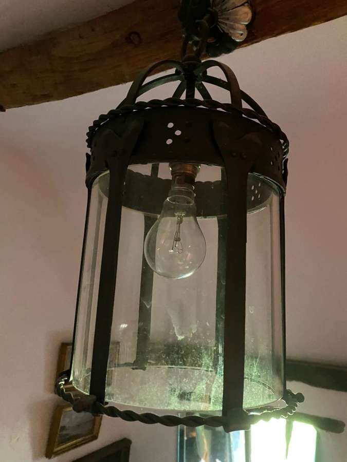 An arts and craft handwrought small lantern