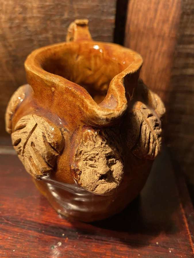 A primitive and rustic jug