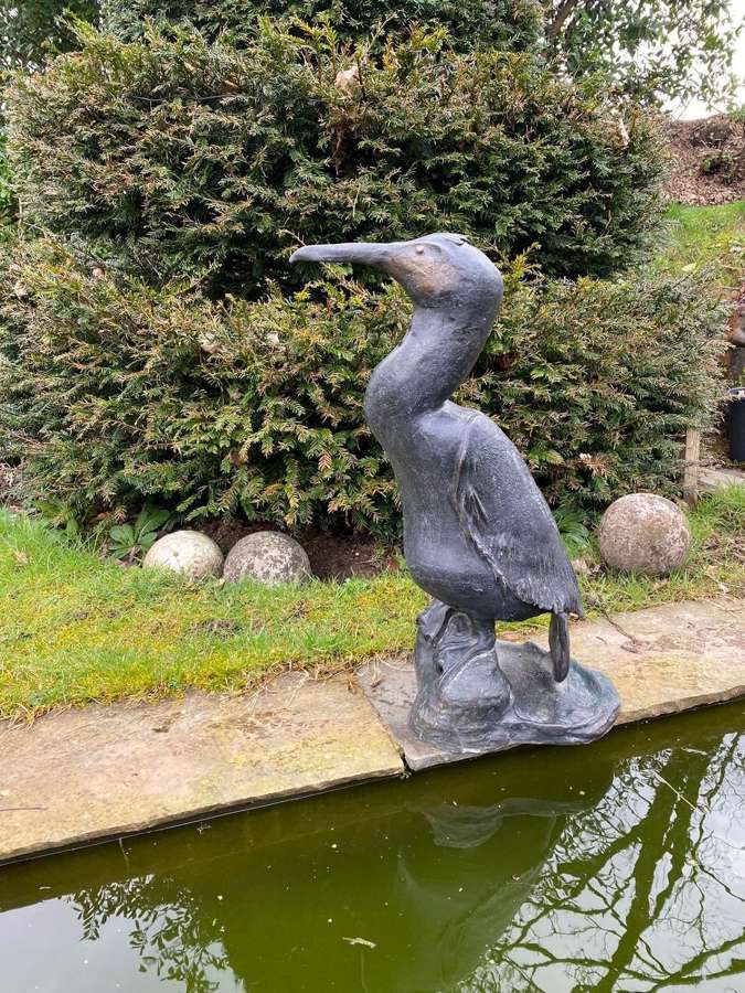 Cast bronze statue of a seabird
