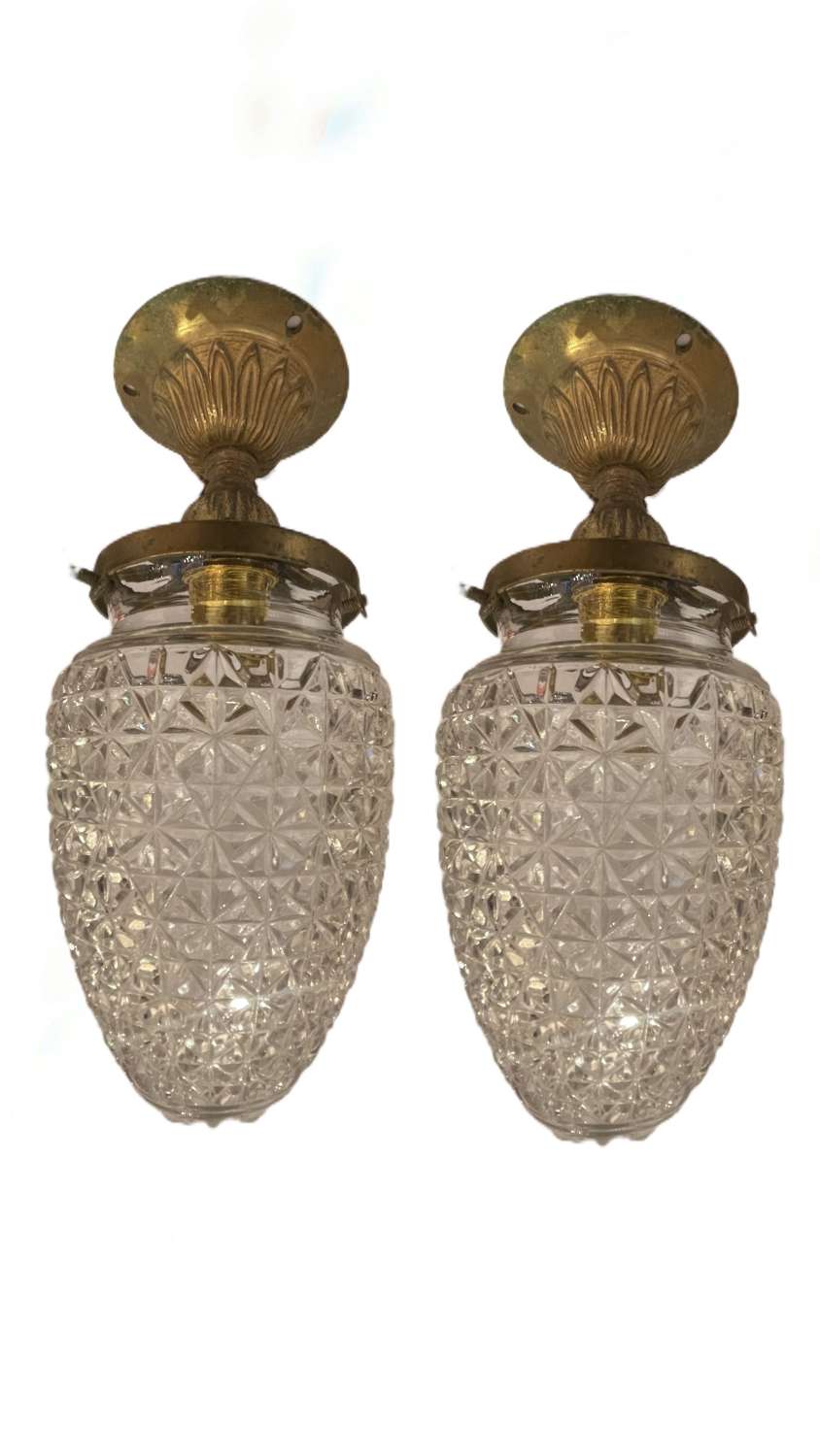 A pair of Edwardian acorn shaped cut Crystal glass ceiling lights