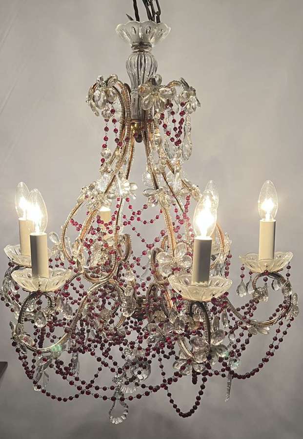 An exquisite Italian six light chandelier
