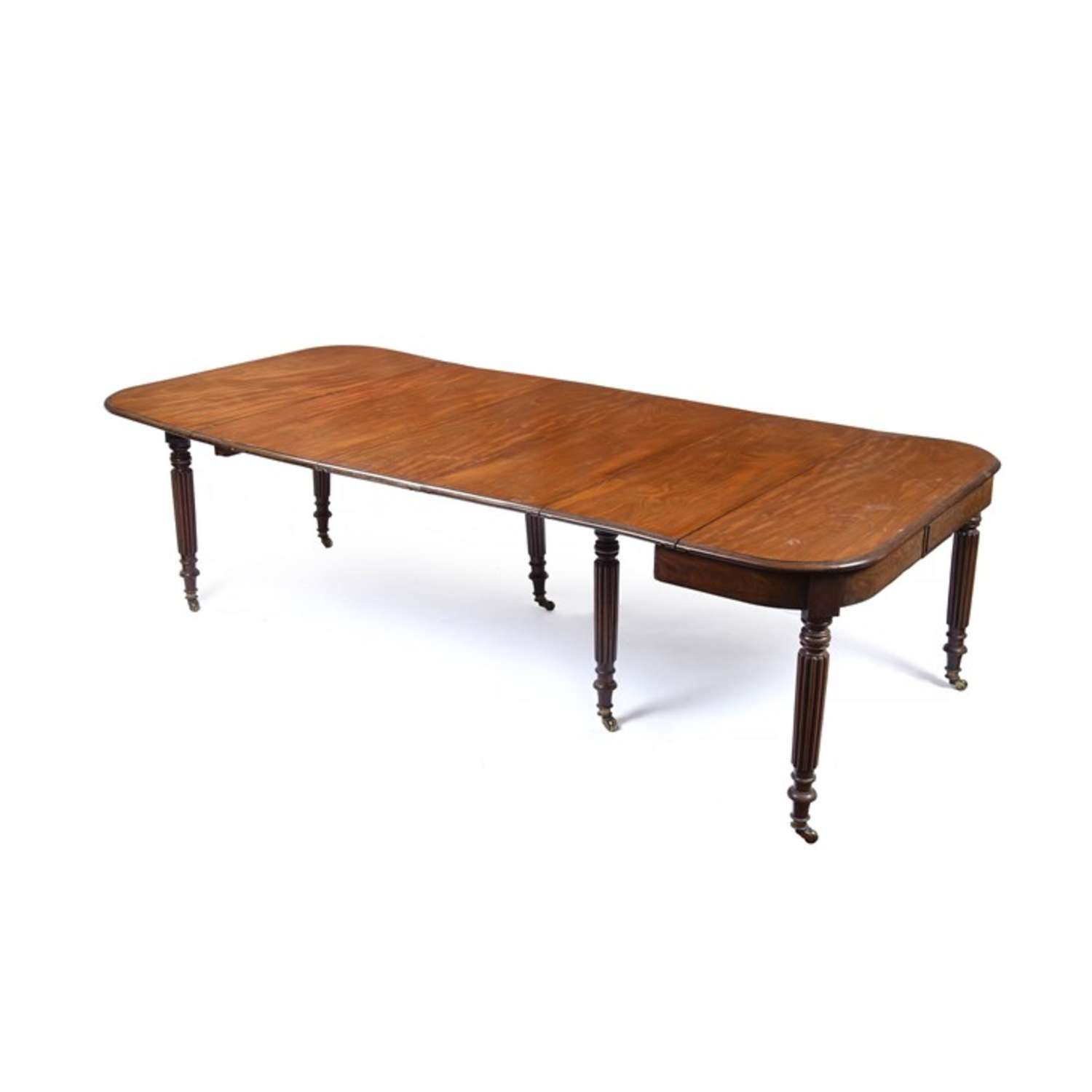 A George IV mahogany 'D' end extending dining table