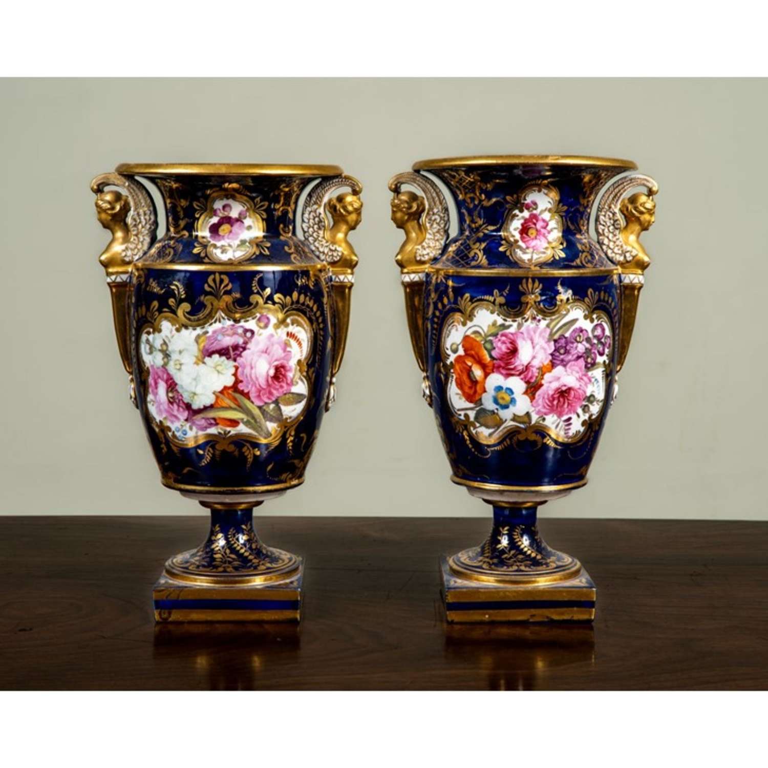 A pair of Coalport-style vases