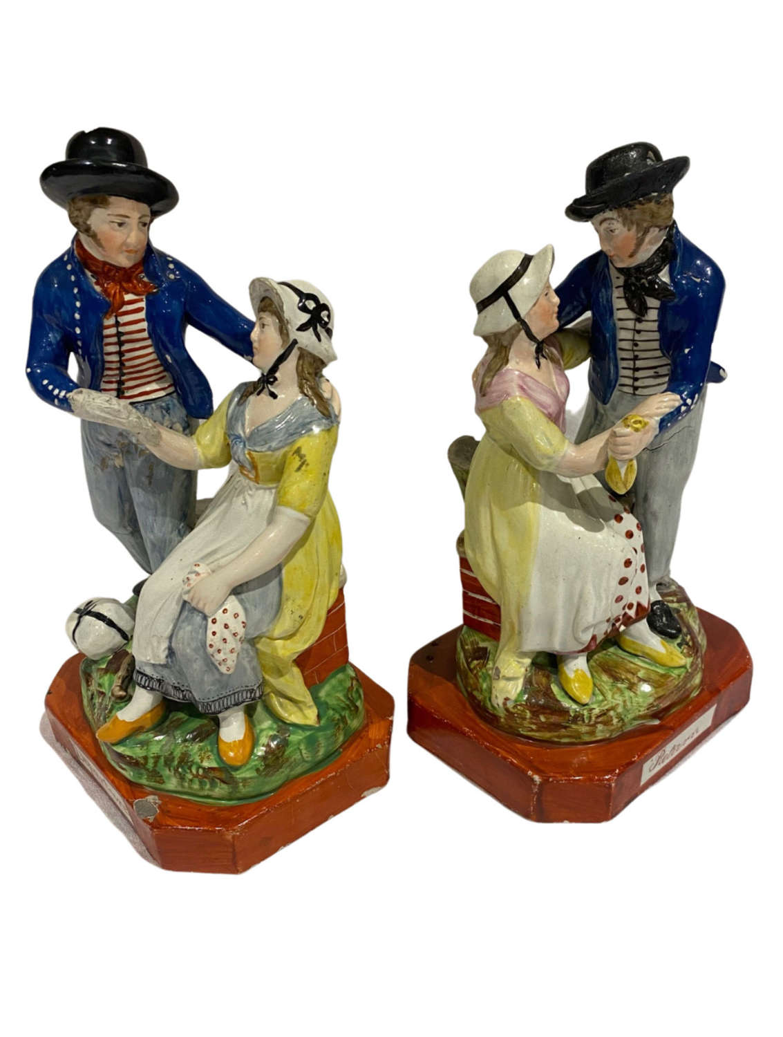 Pair of Staffordshire pottery The sailor departure