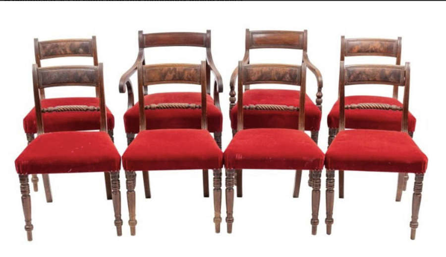 A composed set of eight Regency mahogany dining chairs.