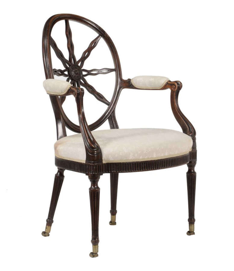 A remarkable George III mahogany open armchair