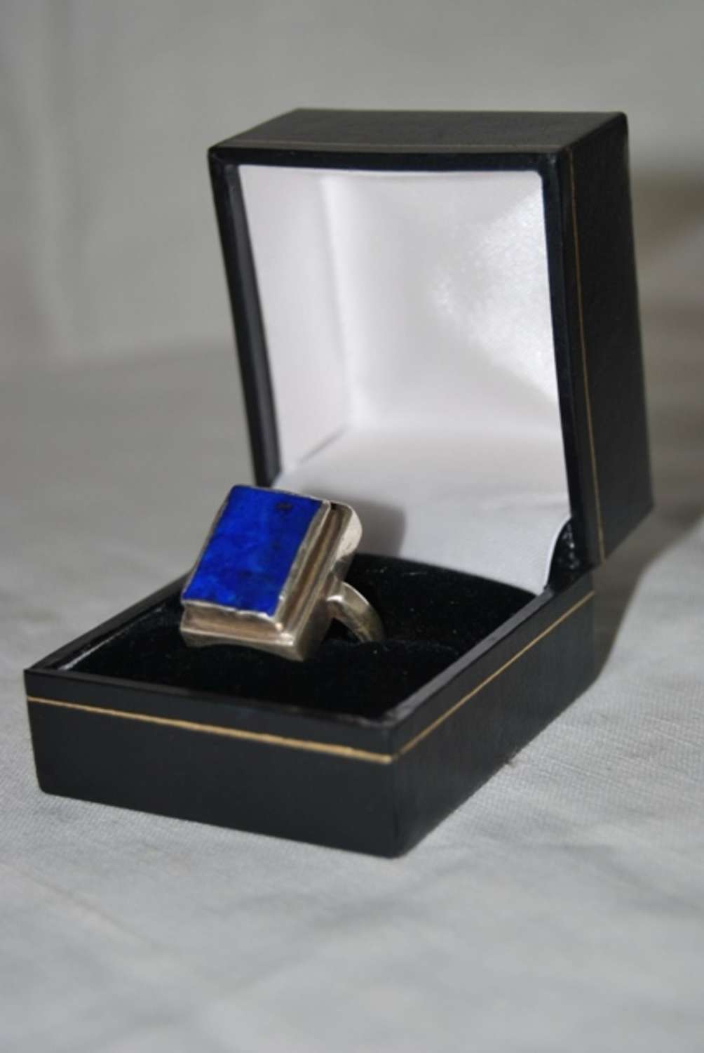 A lapis lazuli silver mounted ring